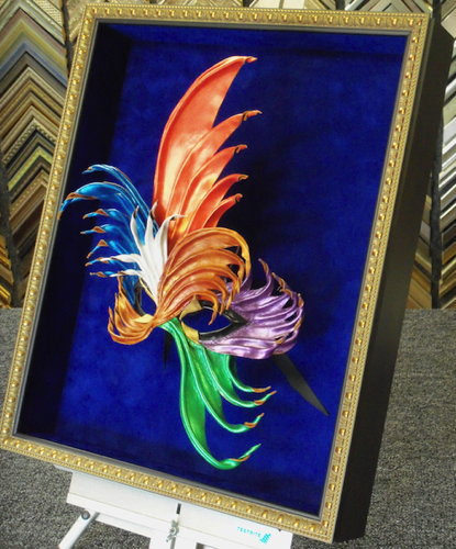 LEATHER MARDI GRAS MASK
20 X 16

MOUNTED ON BLUE SUEDE
GOLD SHADOWBOX